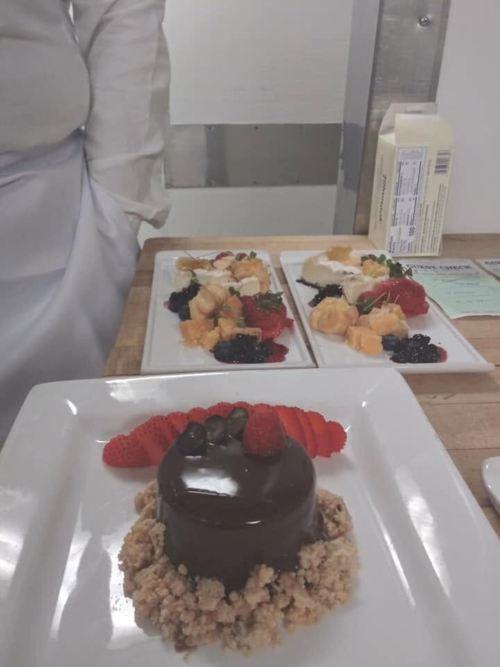 Glazed chocolate cake with berries